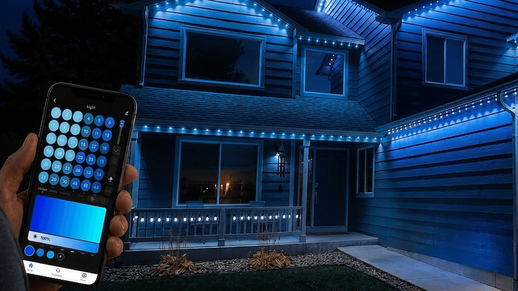 Charleston home with blue permanent roofline lighting controlled from a smartphone app